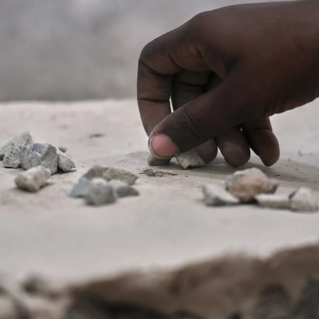 Pebbles held for the stoning ritual at Jamarat during Hajj