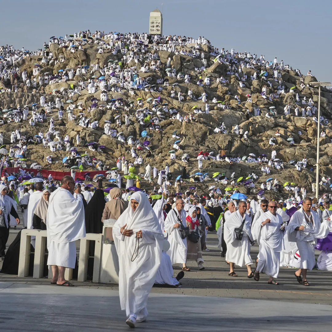 Wide view of pilgrims gathered around Mount Arafat during Hajj