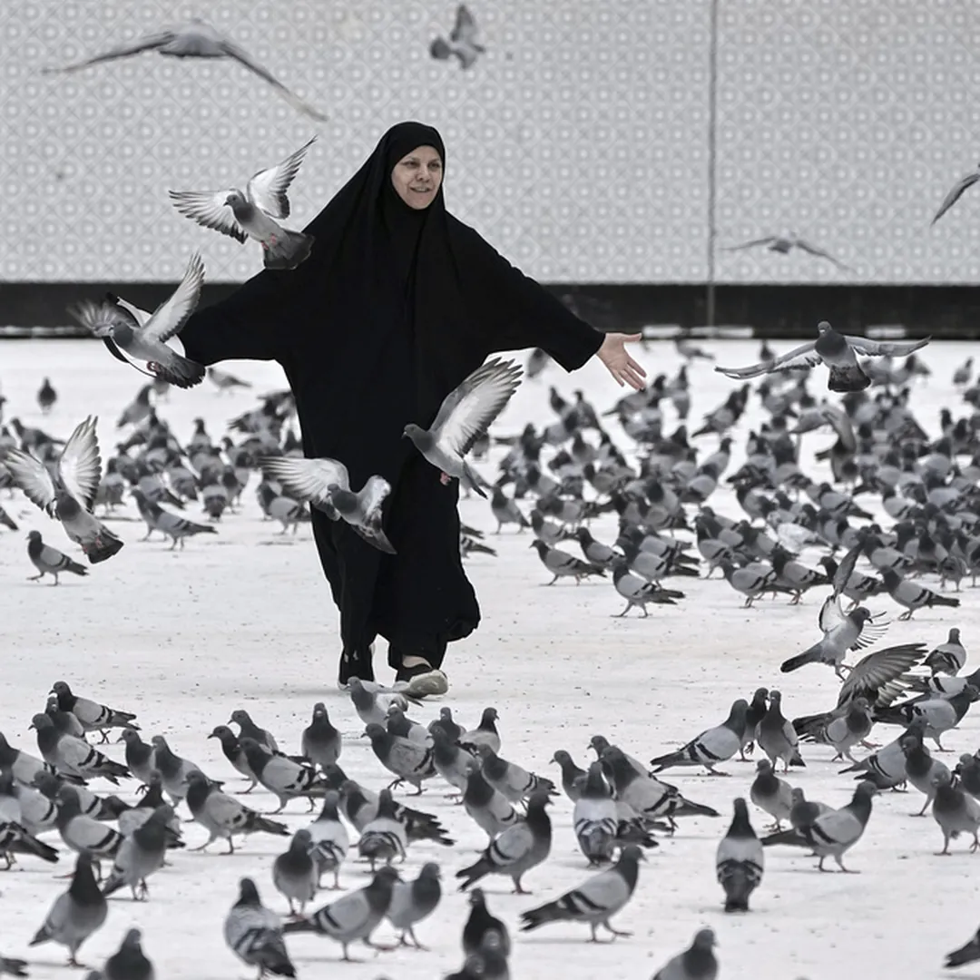 Pilgrim in Makkah reflecting peacefully during Hajj season